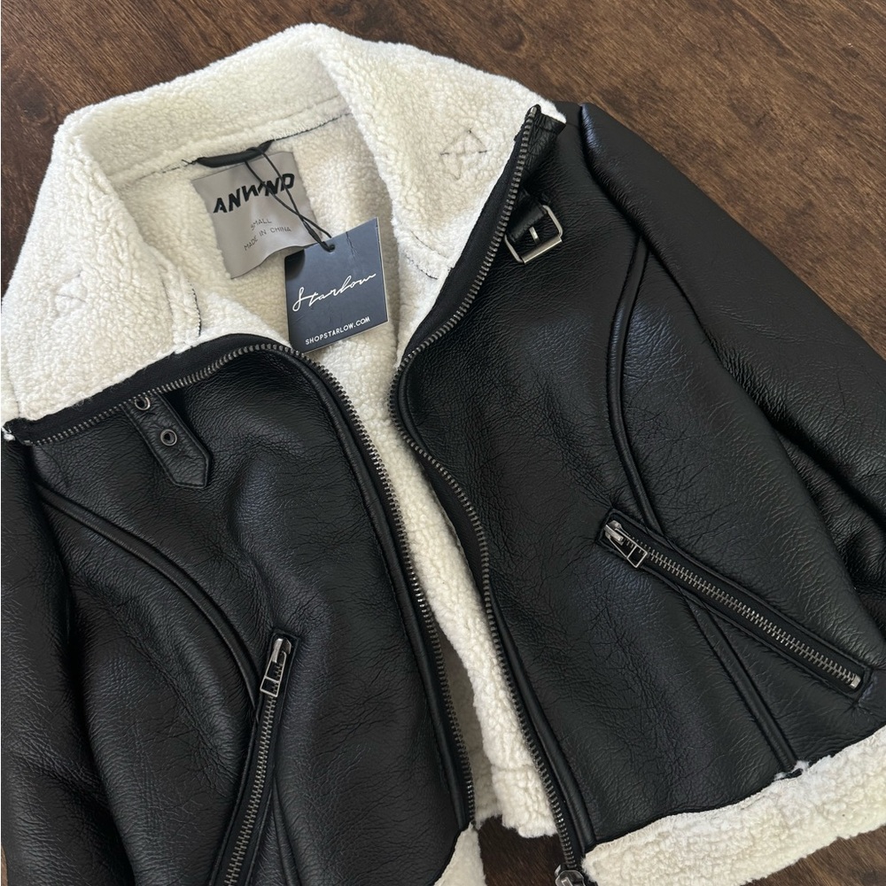 Faux fur black leather jacket